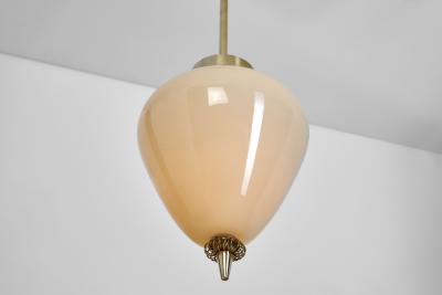  Idman Oy Brass and Amber Tinted Glass Hanging Lamp by Idman Finland Mid 20th century
