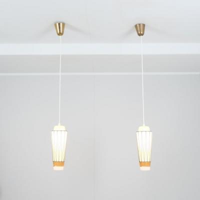  Idman Oy Pair of Mid Century Modern Pendants Model K 3 3 in Glass and Rattan Idman 1950s