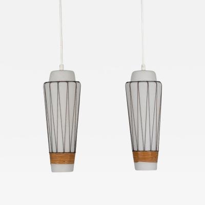  Idman Oy Pair of Mid Century Modern Pendants Model K 3 3 in Glass and Rattan Idman 1950s