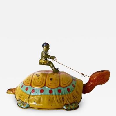  J Chein Co Boy Riding a Turtle Wind Up Toy by J Chein circa 1930s