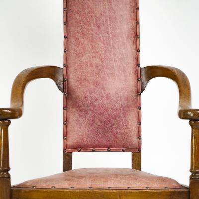  J S Henry J S Henry An ash Arts Crafts armchair with an elongated back curled ears