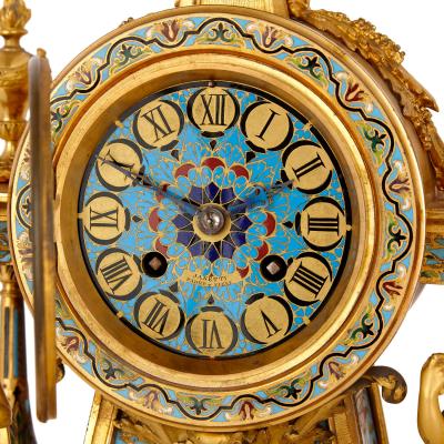 Janetti Father Sons French gilt bronze and enamel three piece clock set