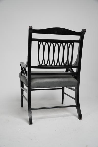  Jas Shoolbred Co Jas Shoolbred attributed A Pair of Anglo Japanese Ebonized Open Armchairs