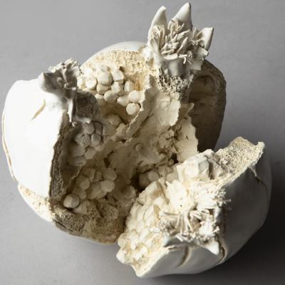  Jean Paul Gourdon SCULPTURE OF A LARGE POMEGRANATE SPLIT OPEN IN GLAZED AND UNGLAZED WHITE FA ENCE