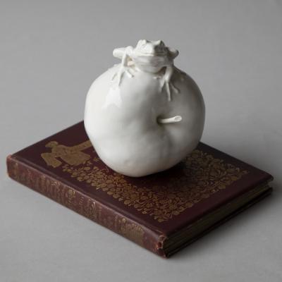  Jean Paul Gourdon SCULPTURE OF A SMALL FROG SITTING ATOP AN APPLE 