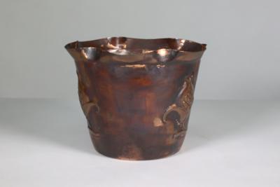  Joseph Sankey Sons Joseph Sankey Sons An Arts Crafts copper planter with embossed flower pod