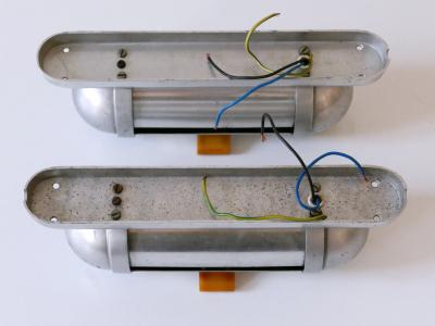  K nig Set of Two Streamline Design Sub Marine Cabinet Sconces by K nig Germany 1940s