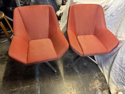  Keilhauer Pair of maroon Keilhauer Swivel Lounge Chairs