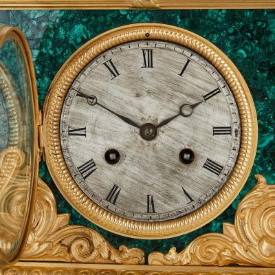  L Leroy Cie Charles X Style ormolu and malachite mantel clock with horse and jockey