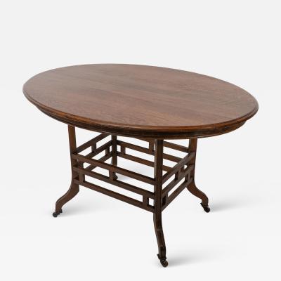  Lambs of Manchester Lambs of Manchester Stamped Lambs A Rare Anglo Japanese Oak Oval Centre Table