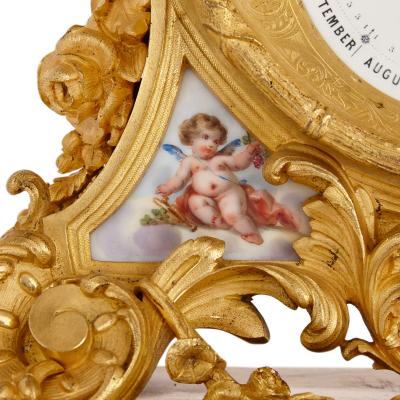 Le Roy et fils Very fine ormolu and S vres style porcelain calendar mantel clock
