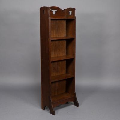  Liberty Co Liberty Co A Slim Arts Crafts Oak Bookcase with Stylized Floral Cut outs