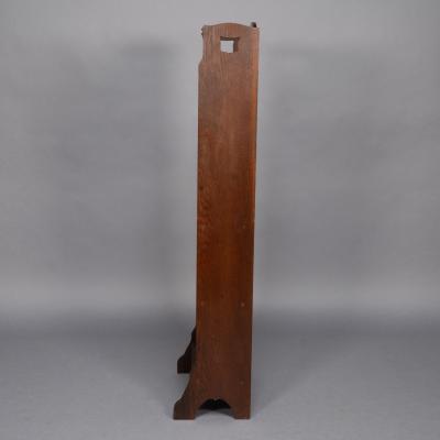  Liberty Co Liberty Co A Slim Arts Crafts Oak Bookcase with Stylized Floral Cut outs