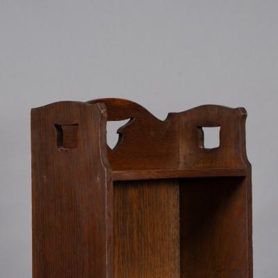  Liberty Co Liberty Co A Slim Arts Crafts Oak Bookcase with Stylized Floral Cut outs