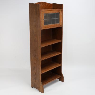  Liberty Co Liberty Co An English Arts Crafts Oak Bookcase with Shaped Upper Details
