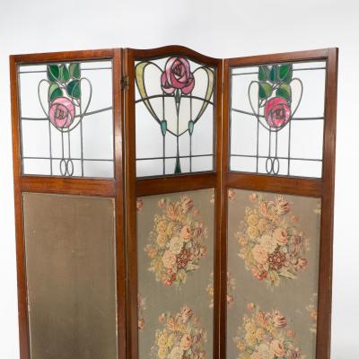  Liberty Co Liberty Co Glasgow style Arts Crafts walnut three fold screen
