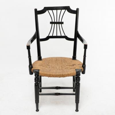 Liberty Co Liberty Co an English Aesthetic Movement Ebonised Armchair with Seagrass Seat
