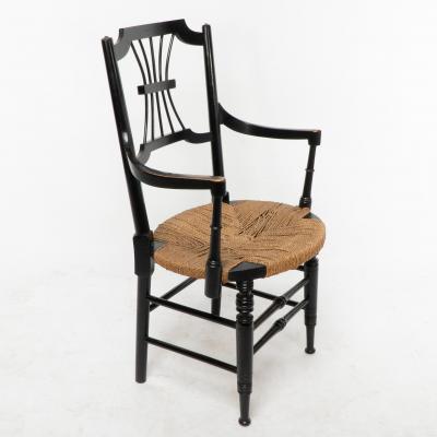 Liberty Co Liberty Co an English Aesthetic Movement Ebonised Armchair with Seagrass Seat