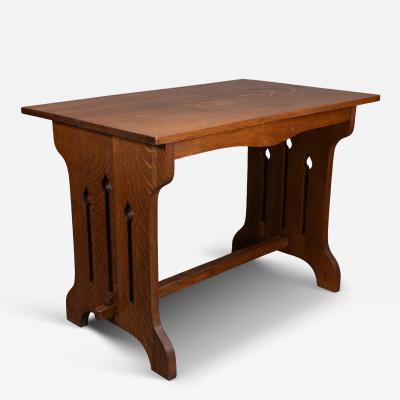  Liberty Co Liberty Co attributed A Small Arts Crafts Oak Dining Table