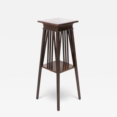  Liberty Co Liberty Co in the style of E W Godwin An Anglo Japanese two tier plant stand