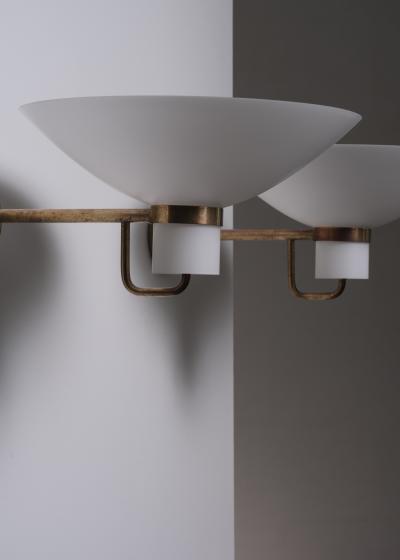  Lyfa Pair of Lyfa brass and opaline glass wall lamps