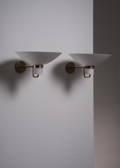  Lyfa Pair of Lyfa brass and opaline glass wall lamps