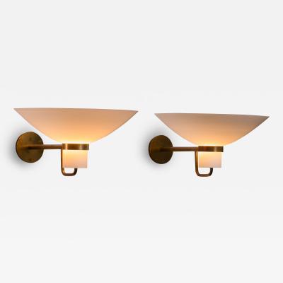  Lyfa Pair of Lyfa brass and opaline glass wall lamps
