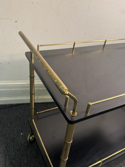 Maison Bagu s BRASS BAMBOO BAR CART WITH BLACK DOUBLE TIERS IN THE STYLE OF MAISON BAGUES