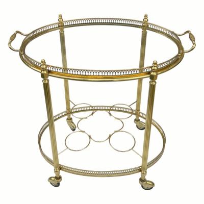  Maison Bagu s Mid century Maison Bagu s Brass Oval Bar Cart circa 1960