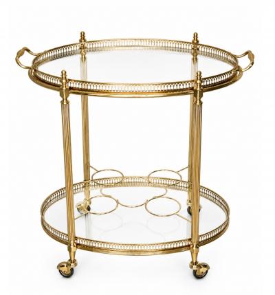  Maison Bagu s Mid century Maison Bagu s Brass Oval Bar Cart circa 1960