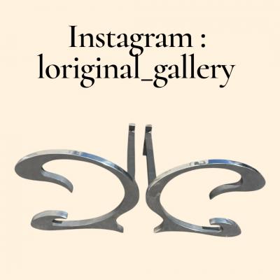  Maison Charles et Fils Pair of 1970s andirons by Charles et Fils