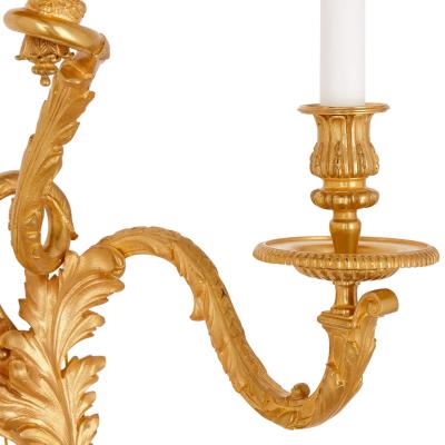  Maison Mottheau et fils Pair of Louis XV Rococo style gilt bronze wall sconces