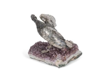  Mario Buccellati An Elegant Mario Buccellati Sterling Silver Duck Perched on an Amethyst Base