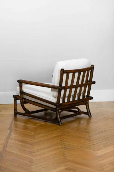 McGuire Furniture Armchair with pouf McGuire San Francisco 1970s