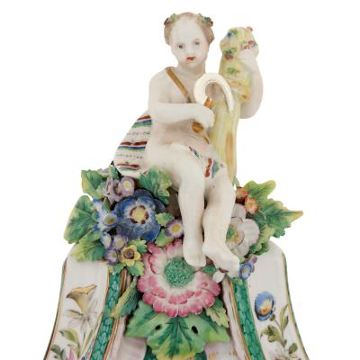  Meissen Porcelain Manufactory Pair of Meissen style porcelain and ebonised wood mirrored wall brackets