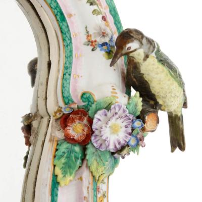  Meissen Porcelain Manufactory Pair of Meissen style porcelain and ebonised wood mirrored wall brackets