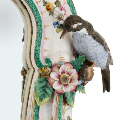  Meissen Porcelain Manufactory Pair of Meissen style porcelain and ebonised wood mirrored wall brackets