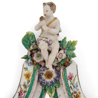  Meissen Porcelain Manufactory Pair of Meissen style porcelain and ebonised wood mirrored wall brackets