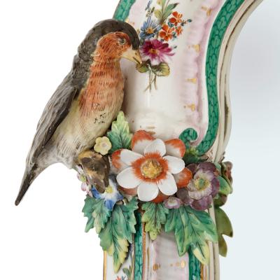  Meissen Porcelain Manufactory Pair of Meissen style porcelain and ebonised wood mirrored wall brackets