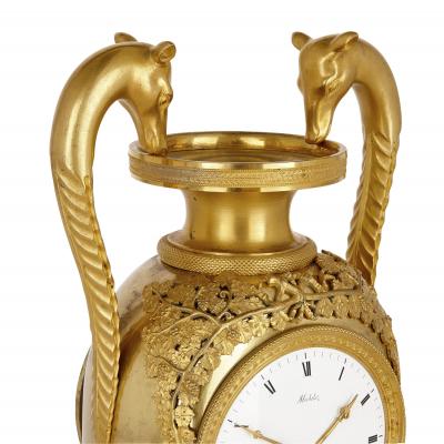 Michelez French Empire period ormolu mantel clock by Michelez