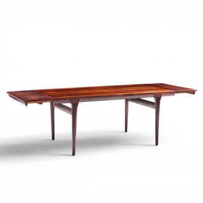  NIELS O MOLLER Niels Moller Danish Rosewood Hidden Leaf Expanding Dining Table with 2 Leaves