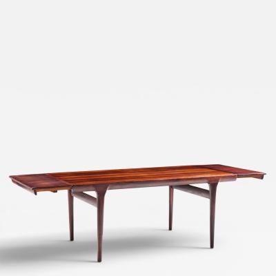  NIELS O MOLLER Niels Moller Danish Rosewood Hidden Leaf Expanding Dining Table with 2 Leaves
