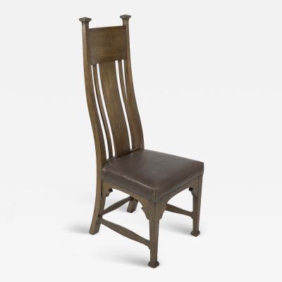  Norman Stacey Norman Stacey attributed An Arts and Crafts high with shaped back oak chair
