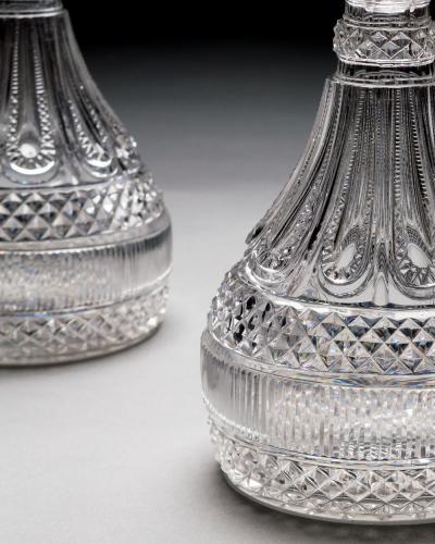  PERRIN GEDDES AN ELABORATELY CUT PAIR OF REGENCY SEMI SHIPS DECANTERS BY PERRIN GEDDES