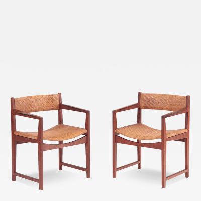  Peter Hvidt Orla M lgaard Nielsen A rare pair of Danish teak armchairs by Hvidt Molgaard Nielsen circa 1950 