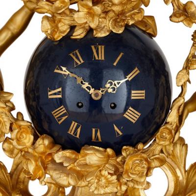  Popon A Paris Large cherub themed gilt bronze clock garniture by Popon