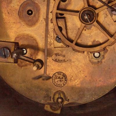  Popon A Paris Large cherub themed gilt bronze clock garniture by Popon