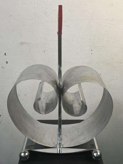  REVERE METALS COMPANY MODERNIST ART DECO CHROME AND RED BAKELITE MAGAZINE RACK BY REVERE