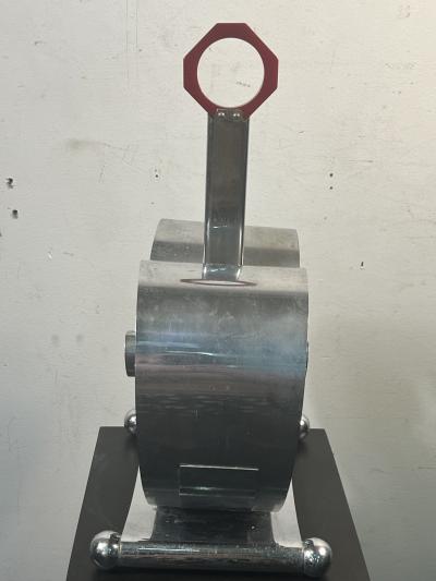  REVERE METALS COMPANY MODERNIST ART DECO CHROME AND RED BAKELITE MAGAZINE RACK BY REVERE