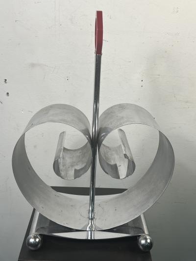  REVERE METALS COMPANY MODERNIST ART DECO CHROME AND RED BAKELITE MAGAZINE RACK BY REVERE